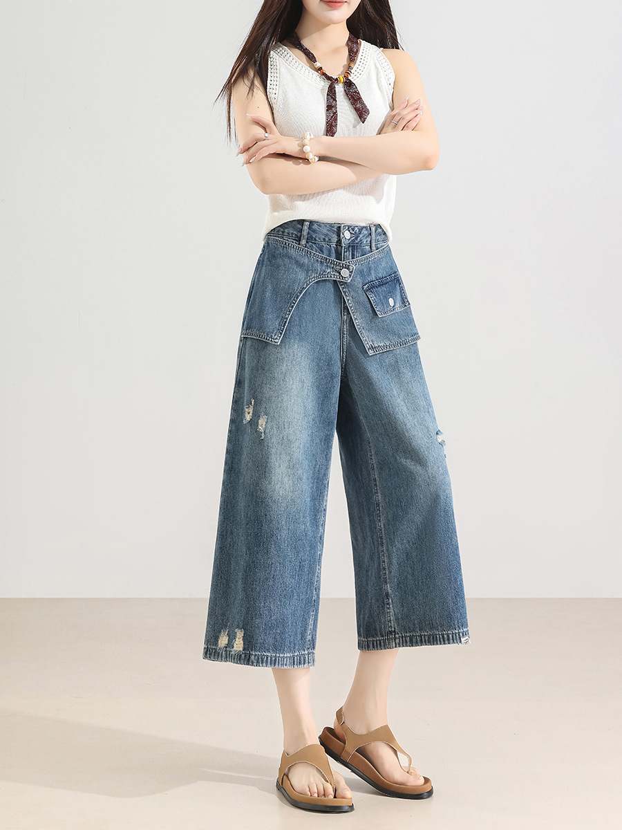 Close-Up Of Elegant Solid Distressed Jeans Clothing Vendor